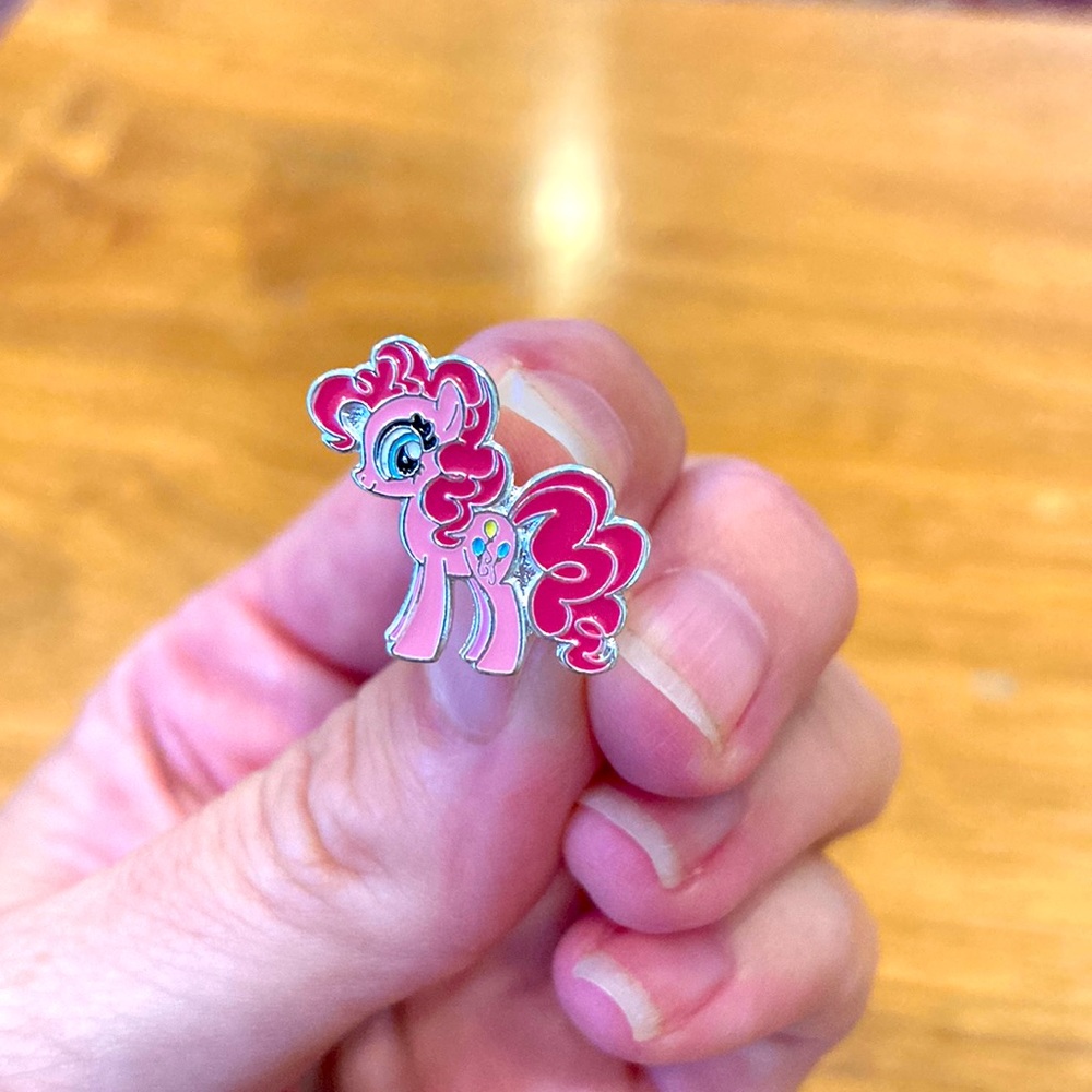 Pinkie Pie earrings. New (never worn) but I don’t have the original tags.